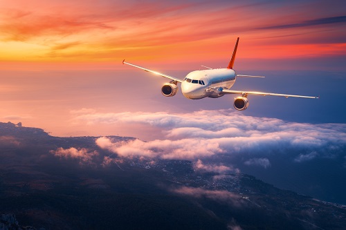  Image shows an Extended-range twin-engine Operational Performance Standard aircraft on a runway