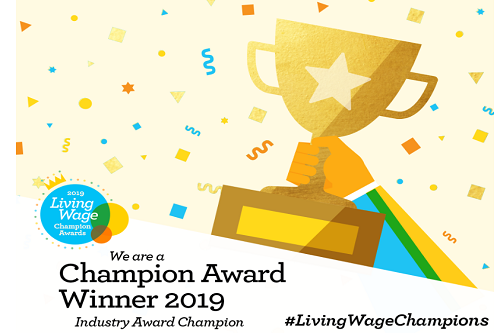 Living Wage Champion Award Winner 2019. A cartoon hand holds up a gold trophy with ticker tape in the background.